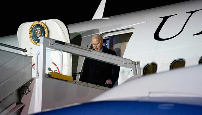 US President Joe Biden disembarks Air Force One at a military airport in Warsaw, Poland, on February 20, 2023. —  AFP