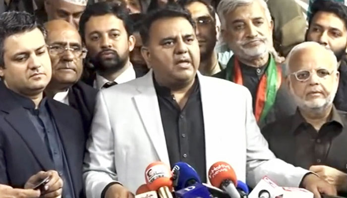 Pakistan Tehreek-e-Insaf (PTI) Senior Vice President Fawad Chaudhry (C) speaking to journalists along with other party leaders in Lahore on February 21, 2023. — YouTube Screengrab via Geo News