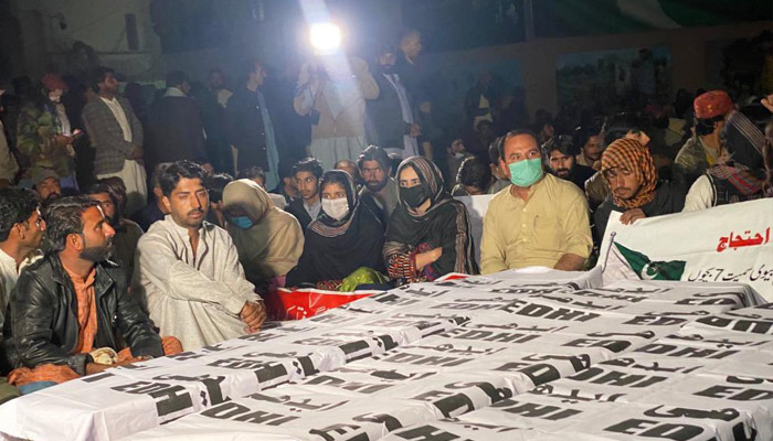 People stage a sit-in outside the Chief Ministers House in Quetta, against the murder of a woman and her two children in Barkhan, on February 21, 2023. — Twitter/@Alijanmaqsood12