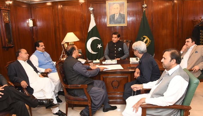 National Assembly Speaker Raja Pervaiz Ashraf (centre) speaks to PTI leaders during a meeting in Islamabad on February 27, 2023. — Twitter/@NAofPakistan