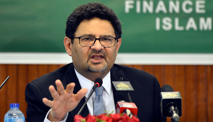 Former Finance Minister Miftah Ismail addressing a press conference. — AFP/File