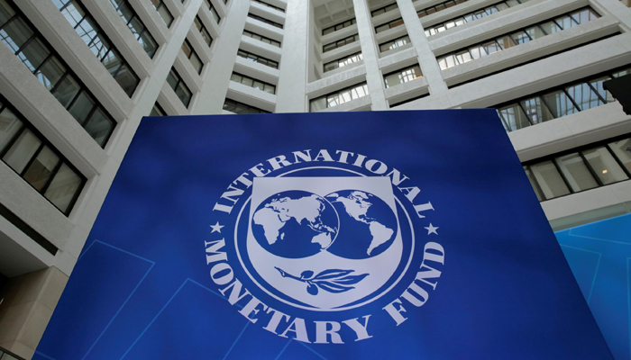 The International Monetary Funds (IMF) logo can be seen outside its building. — AFP/File