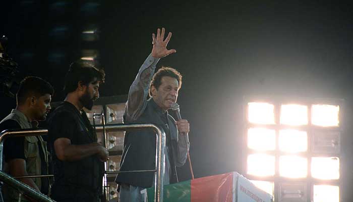 PTI Chairman Imran Khan addresses a public gathering at Iqbal Stadium in Faisalabad on September 4, 2022. — APP
