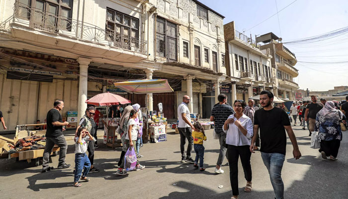 Azoulay stopped in Al-Mutanabbi Street, which has long drawn bibliophiles and has been renovated. AFP/File
