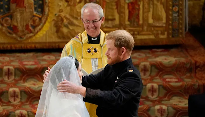 Prince Harry says archbishop was nervous as he married Meghan Markle