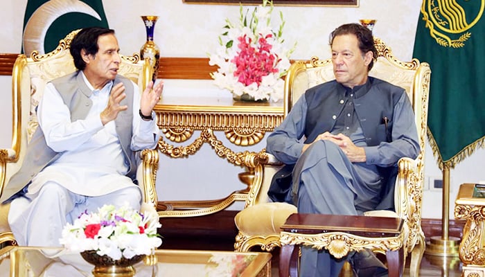Chaudhry Parvez Elahi exchanges views with Imran Khan during a meeting held at Punjab Chief Ministers Office in Lahore on September 26, 2022. — PPI