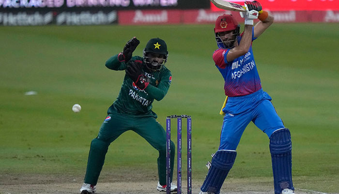 Afghanistan’s Ibrahim Zadran (r) plays a shot during the T20 cricket match of Asia Cup between Pakistan and Afghanistan, in Sharjah, United Arab Emirates on Sept. 7, 2022. — AFP