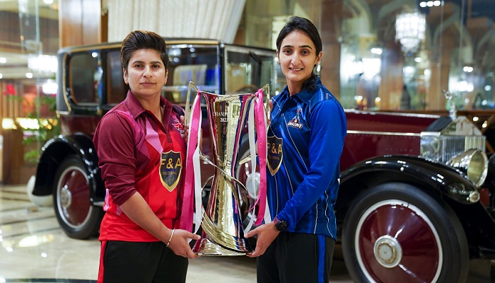 Super Women captain Nida Dar (left) and Amazons captain Bismah Maroof pose with the trophy for the Womens League exhibition matches. — Twitter/ @TheRealPCB
