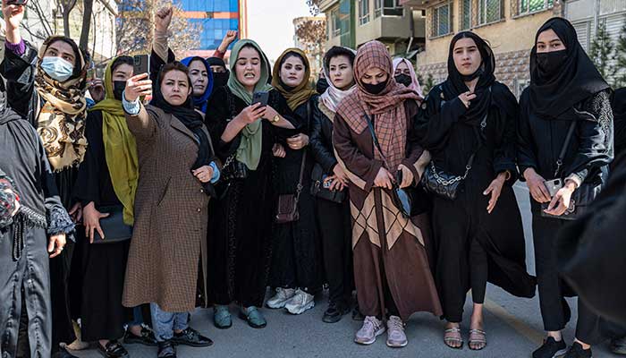 Afghan women stage a protest for their rights to mark International Women´s Day, in Kabul on March 8, 2023. — AFP