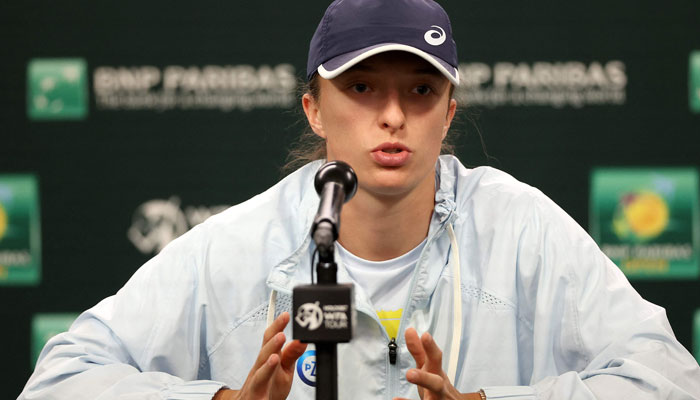 Iga Swiatek of Poland fields questions from the media during the BNP Paribas Open at the Indian Wells Tennis Garden on March 08, 2023 in Indian Wells, California. AFP