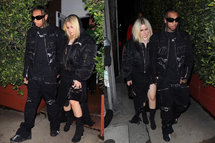 Avril Lavigne and Tyga seen holding hands with matching bomber jackets on dinner date