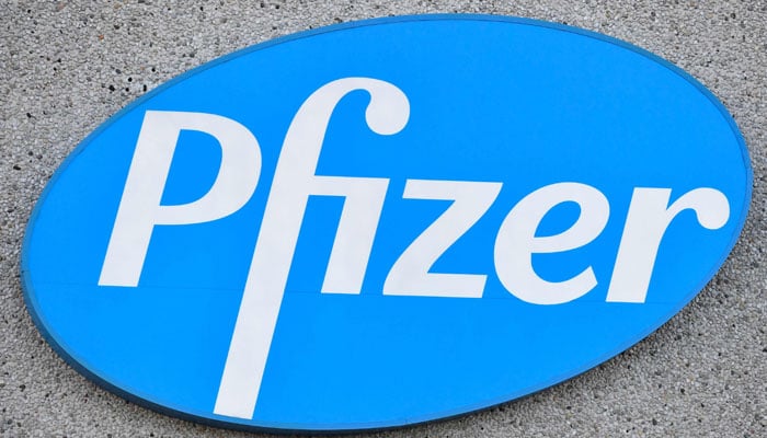 In this file photo taken on December 22, 2020 this photograph taken in Puurs shows the logo of US multinational pharmaceutical company Pfizer. — AFP