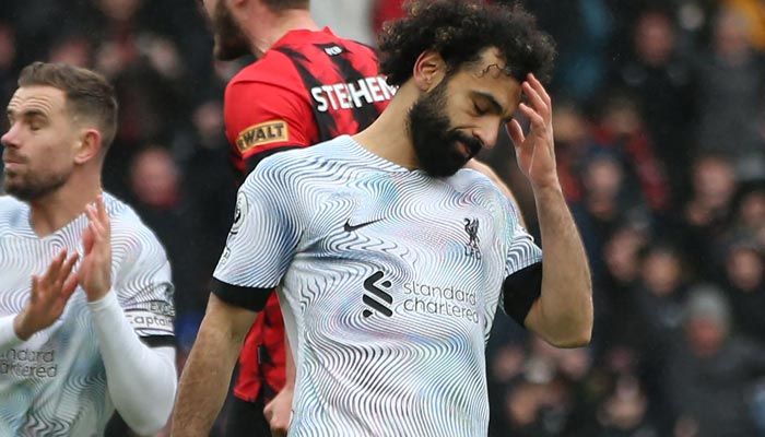 Liverpools Egyptian striker Mohamed Salah reacts after missing his penalty kick during the English Premier League football match between Bournemouth and Liverpool at the Vitality Stadium in Bournemouth, southern England on March 11, 2023. — AFP