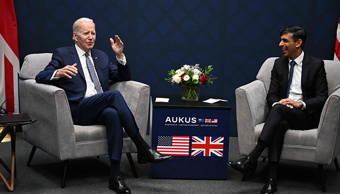 US President Joe Biden (L) speaks alongside British Prime Minister Rishi Sunak during a bilateral meeting at the AUKUS summit on March 13, 2023, at Naval Base Point Loma in San Diego California. AUKUS is a trilateral security pact announced on September 15, 2021, for the Indo-Pacific region.—AFP