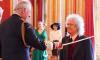 Queen Guitarist Brian May knighted for his services to music and charity by King Charles