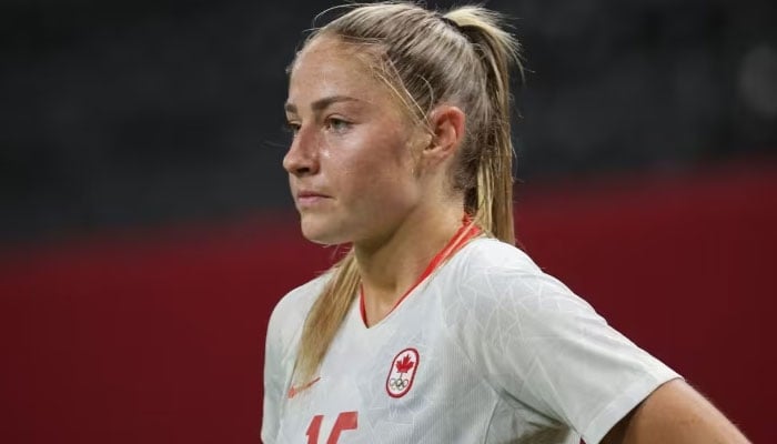 Canadas forward Janine Beckie looks on during her teams match against Chile during the Tokyo 2020 Olympic Games at the Sapporo Dome in Sapporo, Japan, On Saturday. Beckie scored both her countrys goals in a 2-1 victory. AFP/File