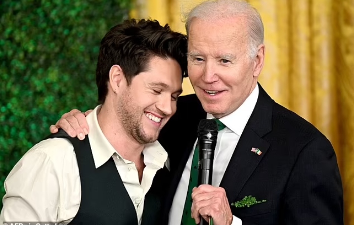 Niall Horan shares a laugh with President Biden while performing at the White House