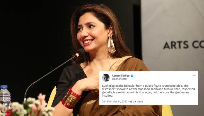 Mahira Khan smiles during the event An Evening with Mahira Khan at the Arts Council, Karachi on March 19 with a tweet by Adnan Siddiqui critcising the PML-N senator who made derogatory comment against Mahira and Anwar Maqsood. — Twitter/@ACPKHI/@adnanactor