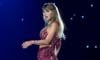 Taylor Swift surprises fans by diving from stage during Eras Tour concert