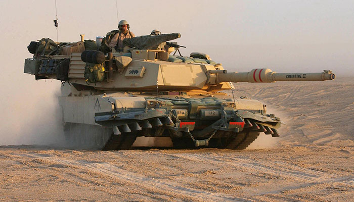 In this photograph taken on March 18, 2003, a US M1A1 Abrams tank from the US Army 3rd Infantry Division in the northern Kuwait desert advances close to Iraq. The United States will deliver Abrams tanks to Ukraine by the fall of 2023 -- significantly faster than expected -- while Patriot air defences will also arrive on an expedited timeline, the Pentagon said on March 21, 2023. —AFP