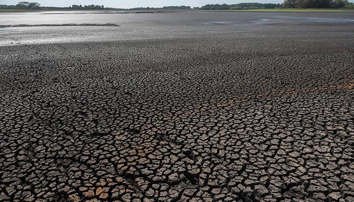 In this file photo taken on March 14, 2023 picture of the dried Canelon Grande reservoir just north of Canelones, in southern Uruguay, as the country goes through a severe drought. AFP/File