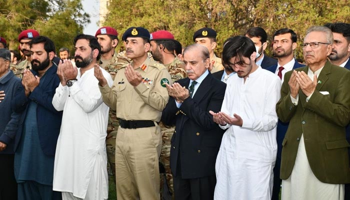 (L-R) Chief of Army Staff (COAS) General Syed Asim Munir, Prime Minister Shehbaz Sharif and President Dr Arif Alvi attend the funeral of Brigadier Mustafa Kamal Barki held at Race Course, Rawalpindi on March 22, 2023. — ISPR