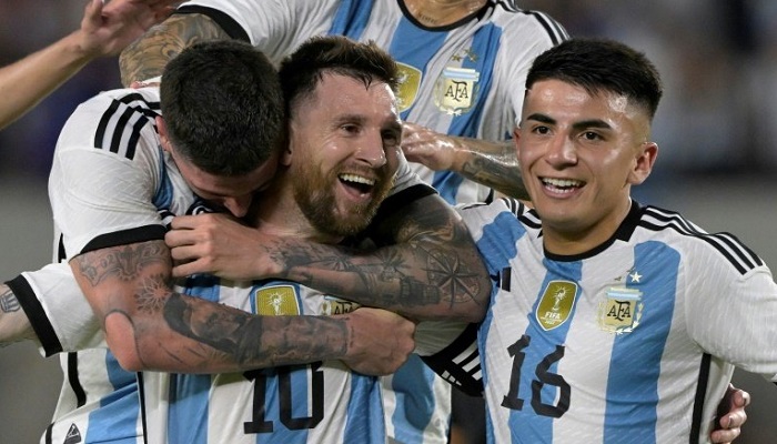 Lionel Messi (centre) and his world champion Argentina team-mates celebrate his goal against Panama on a night of festivities in Buenos Aires. — AFP