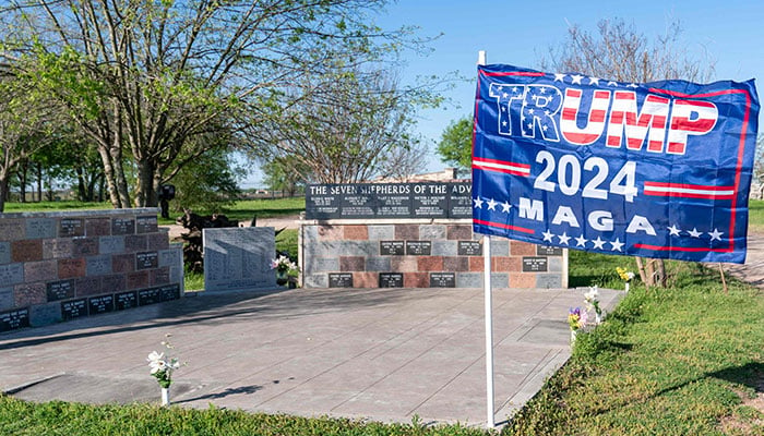 A flag for former US President Donald Trump is planted at the Branch Davidians Memorial in Waco, Texas, on March 25, 2023. —AFP