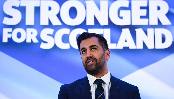 Newly-appointed leader of the Scottish National Party Humza Yousaf speaks following the SNP Leadership election result announcement at Murrayfield Stadium in Edinburgh on March 27, 2023. — AFP