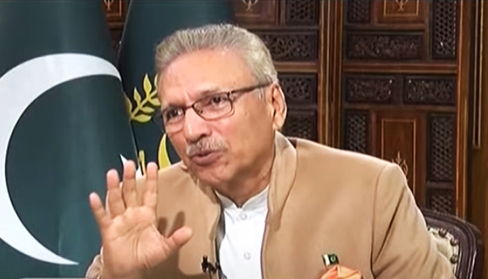 President Arif Alvi speaks during an interview with Geo News Hamid Mir in Islamabad, on March 29, 2023, in this still taken from a video. — YouTube/GeoNews