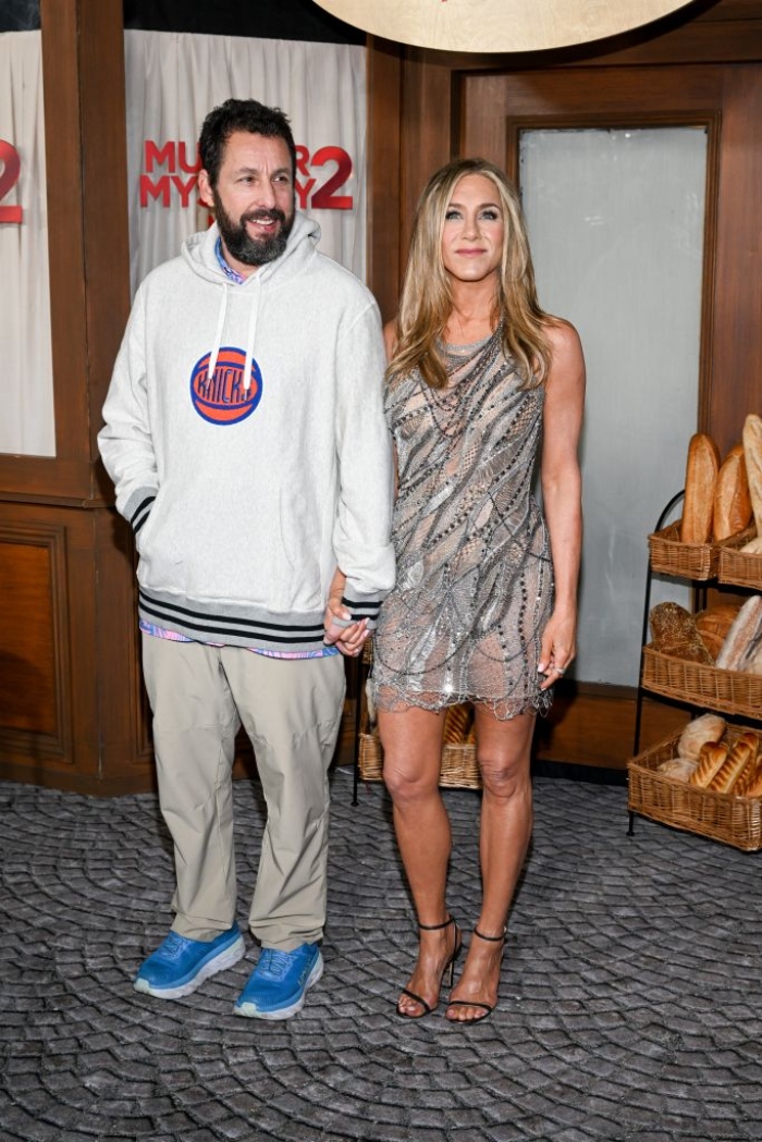 Jennifer Aniston mocks Adam Sandler for wearing sweatshirt to ‘Murder Mystery 2’ premiere