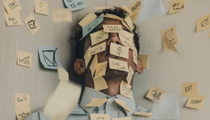 A person with sticky notes on his face.— Unsplash