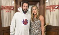 Jennifer Aniston mocks Adam Sandler for wearing sweatshirt to ‘Murder Mystery 2’ premiere