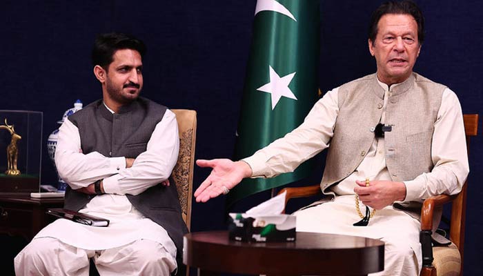 PTI social media advisor Azhar Mashwani (left)  and former prime minister Imran Khan before a press conference at his personal residence in Lahore. — Facebook/AzharQaziMashwani