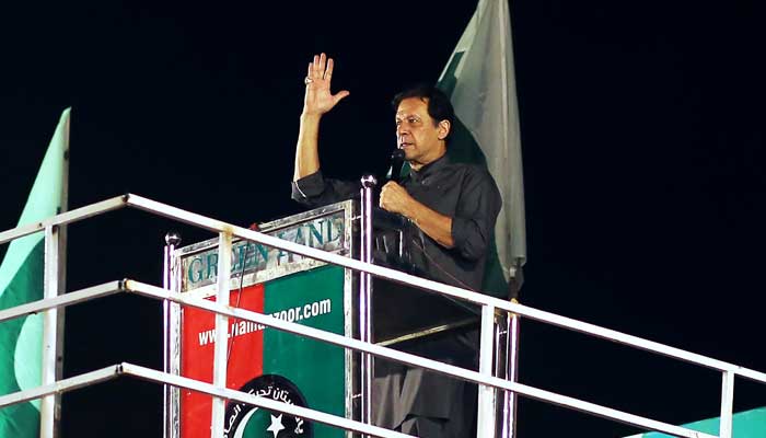 PTI Chairman Imran Khan delivers a speech in Multan in September 2022. — AFP