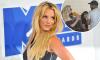Britney Spears steps out with mystery man after ditching wedding ring