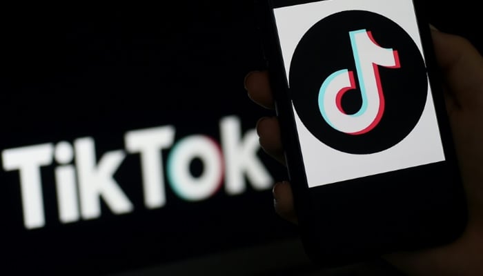 A TikTok logo is displayed on a smartphone in this illustration. — AFP/File