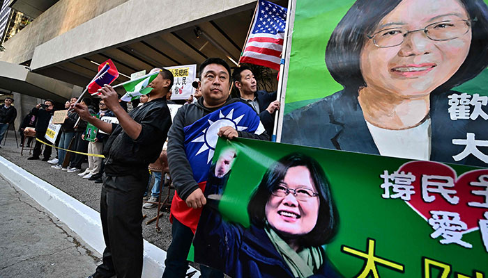 Taiwan supporters hold signs during a rally in front of the Westin Bonaventure hotel where Taiwan President Tsai Ing-wen will spend the night ahead of meeting with Kevin McCarthy, in Los Angeles, April 4, 2023.—AFP