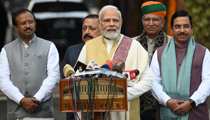 Indias Prime Minister Narendra Modi (C) speaks to the media at the opening of the budget session of Parliament in New Delhi on January 31, 2023. — AFP