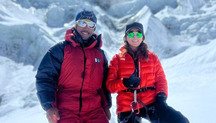 Pakistani climbers Naila Kiani (centre) and Shehroze Kashif (right). — Twitter/@sajid_sadpara