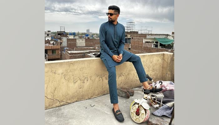 Pakistan cricket team skipper Babar Azam poses for a picture taken at his childhood home on April 22, 2023. — Twitter/@babarazam258