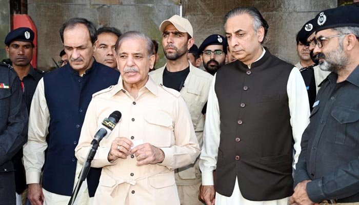 Prime Minister Shehbaz Sharif speaks to media persons outside Central Jail Kot Lakhpat in Lahore on April 22, 2023. — PID