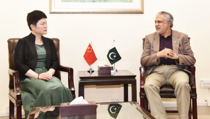 Chinese Charge dAffaires Pang Chunxue meets Finance Minister Ishaq Dar on April 25, 2023. — APP
