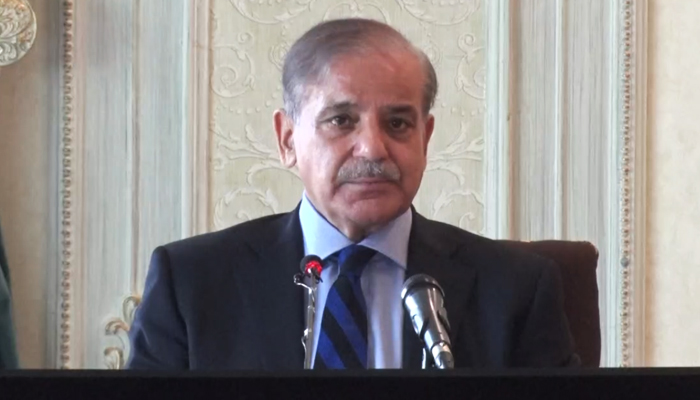 Prime Minister Shehbaz Sharif addresses a meeting of coalition partners in Islamabad on April 26, 2023, in this still taken from a video. — YouTube/GeoNews