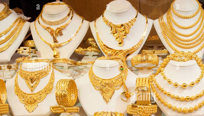 Gold jewellery is displayed at a store in this undated file photo. — AFP