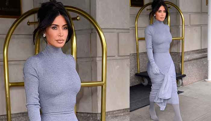 Kim Kardashian mengejutkan penonton saat dia menyelipkan sosok langsing ke dalam gaun abu-abu yang memeluk tubuh untuk jalan-jalan