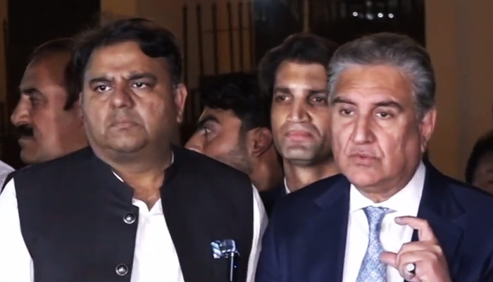 PTI Vice Chairman Shah Mahmood Qureshi (right) speaks to media in Islamabad, on April 27, 2023, in this still taken from a video. — Twitter/@PTIOfficial