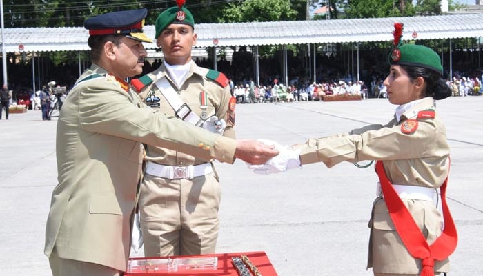 Chief of Army Staff General Asim Munir hands over the Sword of Honour to a cadet during  the passing out parade of cadets of Pakistan Military Academy (PMA) held in Kakul on April 29, 2023. — ISPR