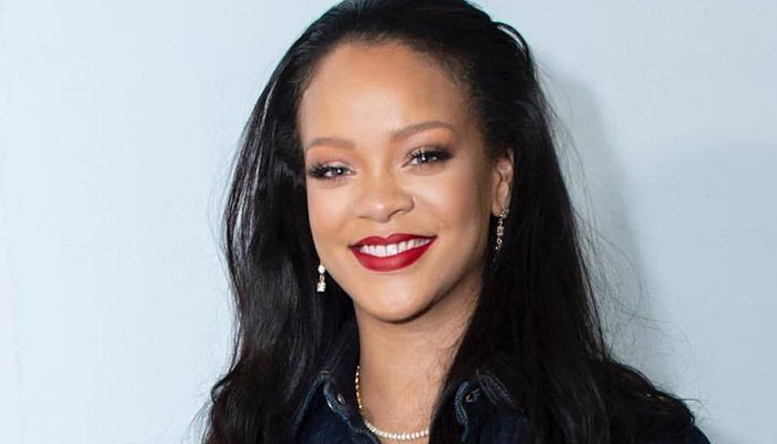 Rihanna flaunts her baby bump in latest photos