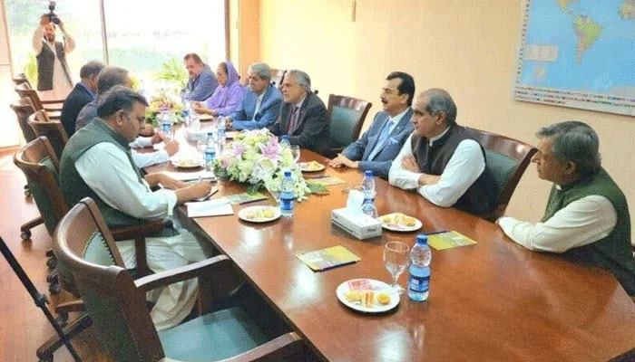 Government (right) and PTI leaders during election date talks in Islamabad, on April 28, 2023. — Twitter/PTI/File